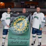Sept 15, 2018 - Evan White (left), Aces Vice President Chris Horne, and Michael Waugh hold the "We Play For Them" banner, which will be displayed inside the Garcelon Civic Centre.