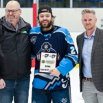 Edmundston Blizzard forward Carl-Anthony Massé (middle) is presented with the Metalfab MHL Cup Playoff MVP by Metalfab Ltd. Business Development Manager Ryan Stacey (left) and MHL Commissioner Matt Moore. (Photo: Percy Picard)
